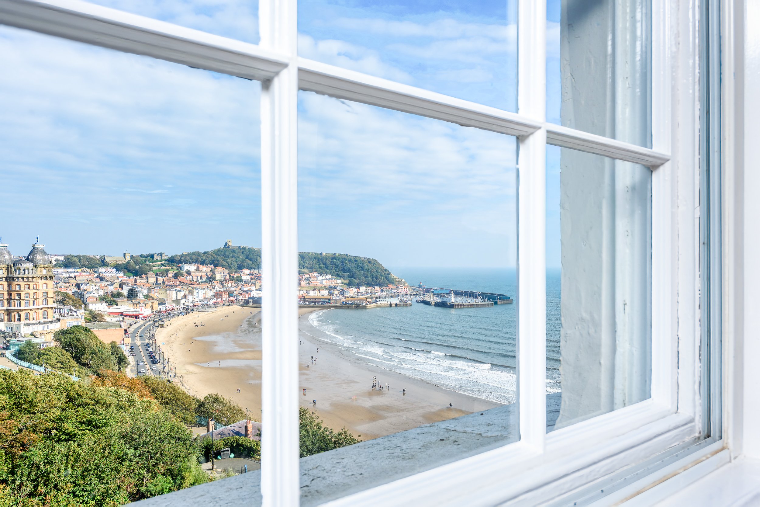 View from the Esplanade Hotel overlooking Scarborough South Bay, harbour and coastline.