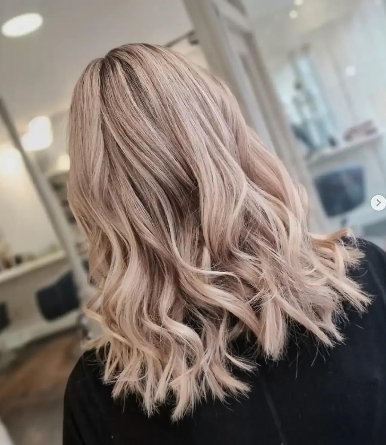 Women's shoulder-length wavy blonde hair at Albert Fields