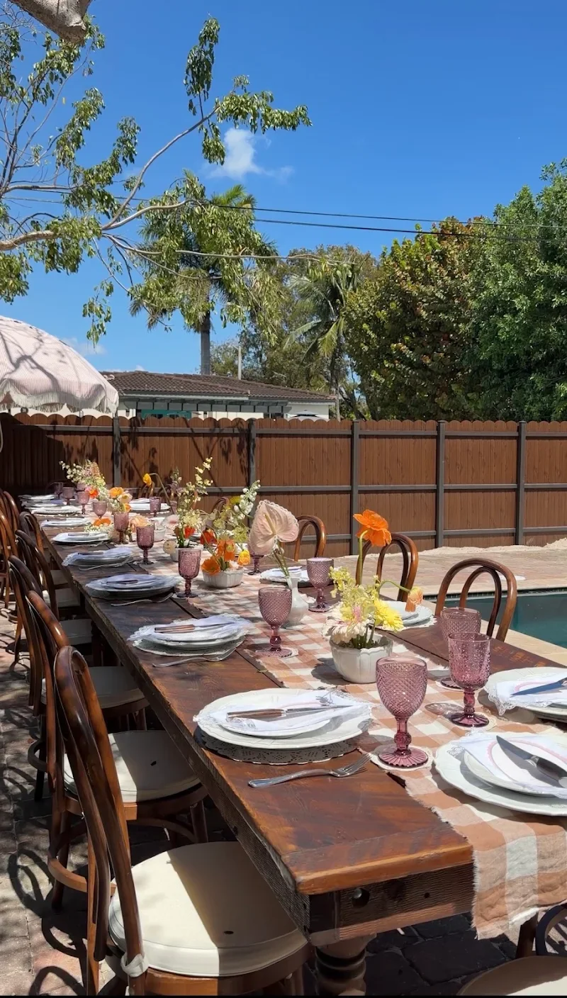 8-foot handcrafted farm table in cedar, available for baby shower rental in Miami