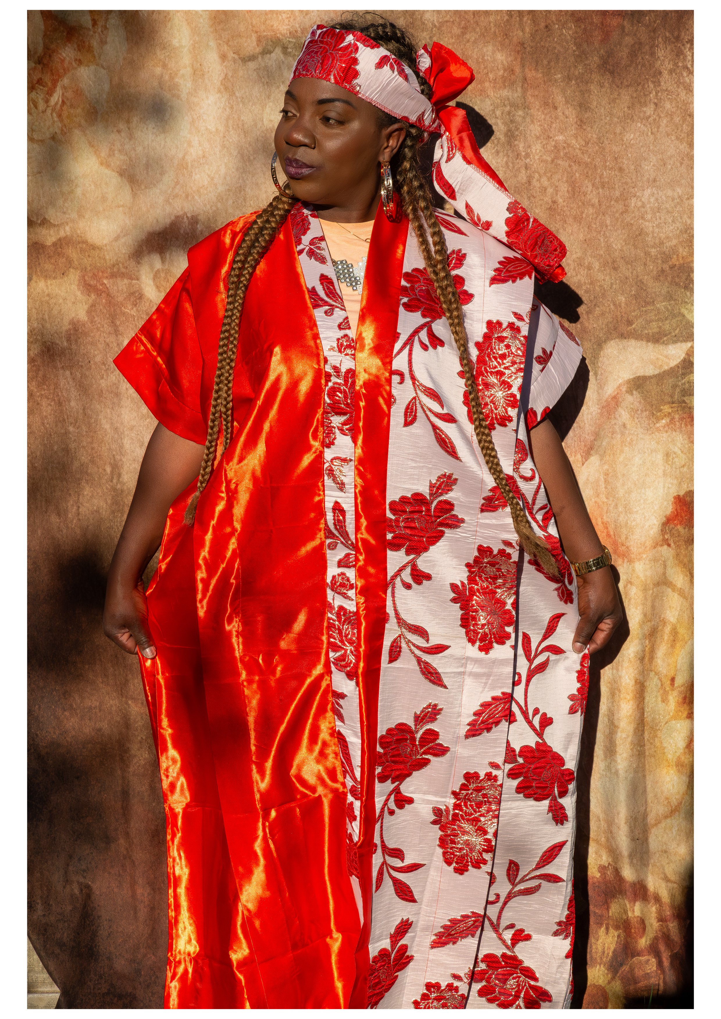 Cameroon and the Bamileke tribe. Wearing Damask brocade material, often called Bazin Riche in West Africa.