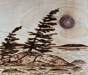 Wooden panel with a painted landscape of trees and a moon over water.