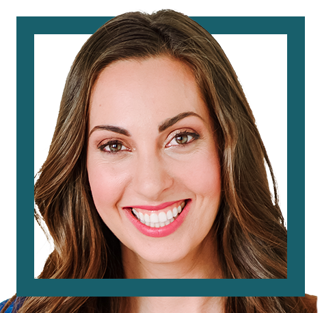 Close-up of a smiling woman with long brown hair, wearing makeup and a pink lipstick, framed by a teal border.