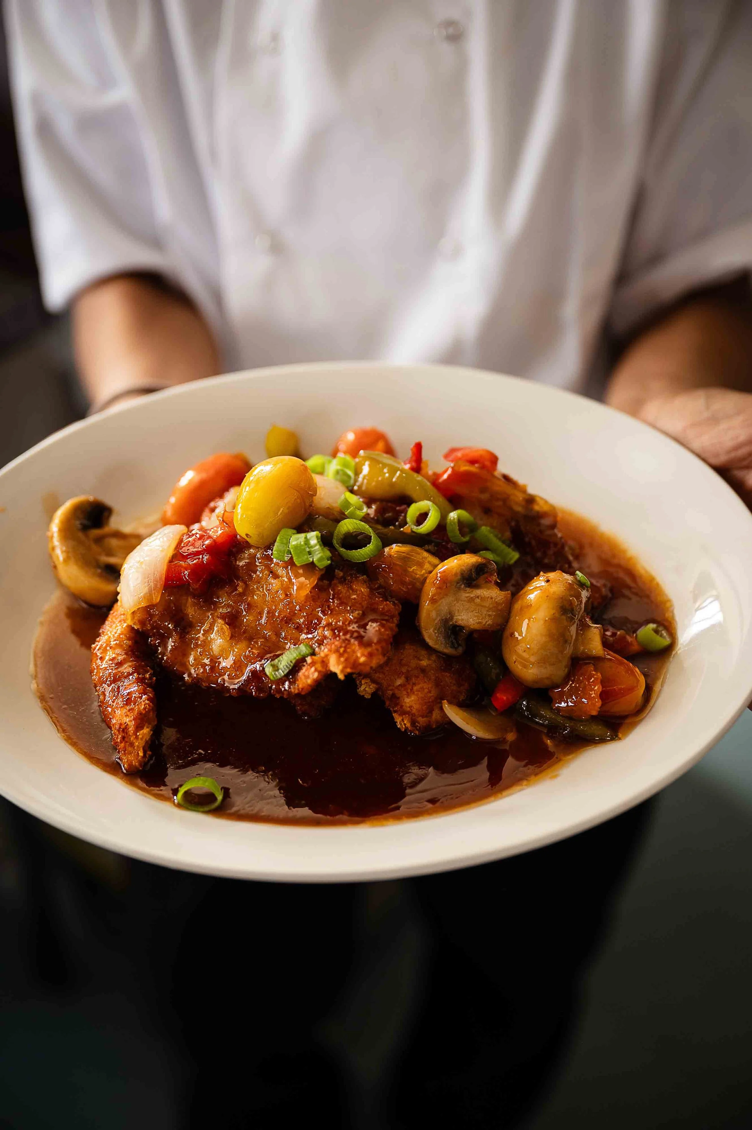Panko coated chicken breast with sweet and sour sauce at the Tiny Thai