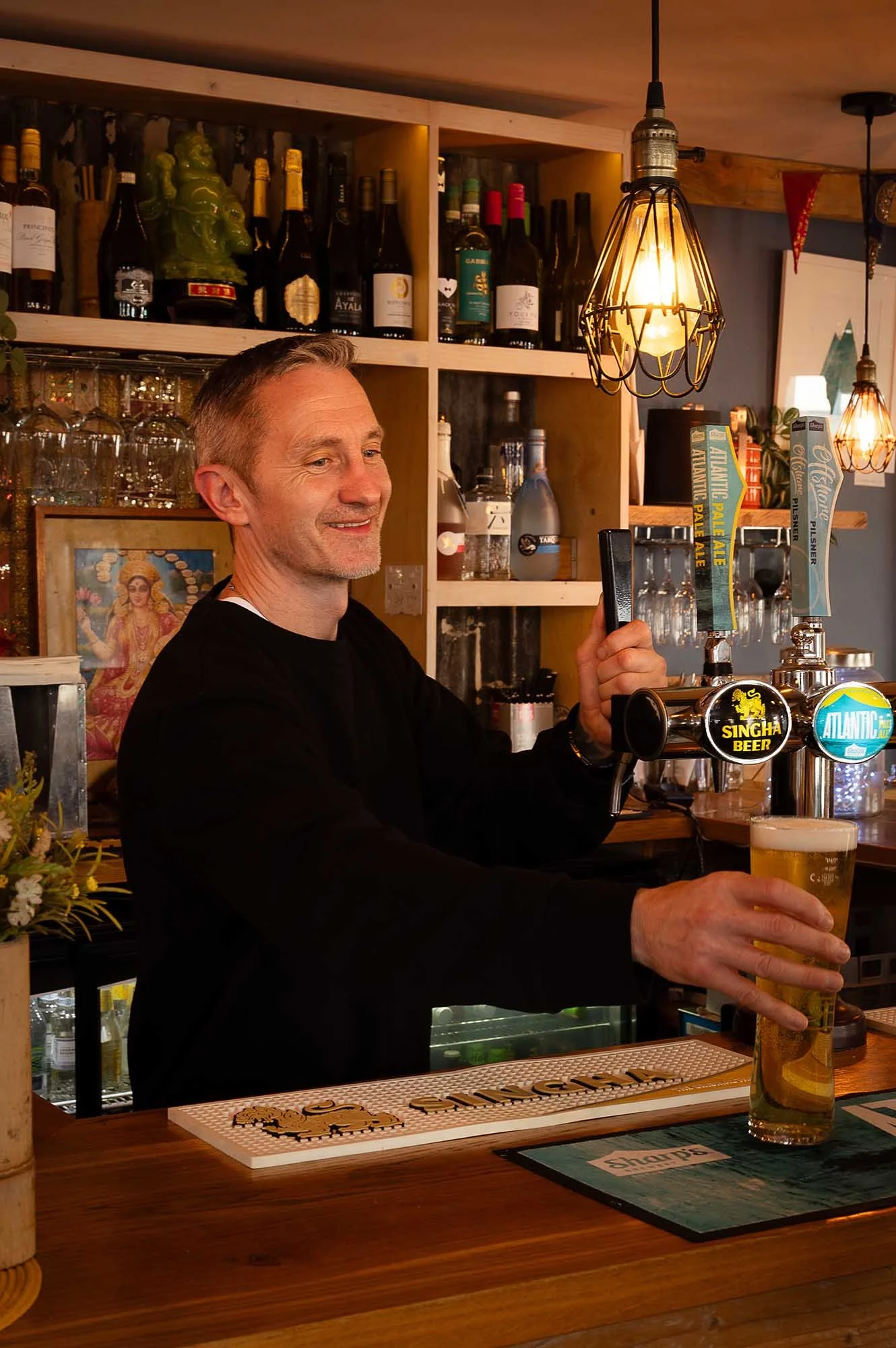 Steve serves at the Bar at the Tint Thai Restaurant in Wadebridge