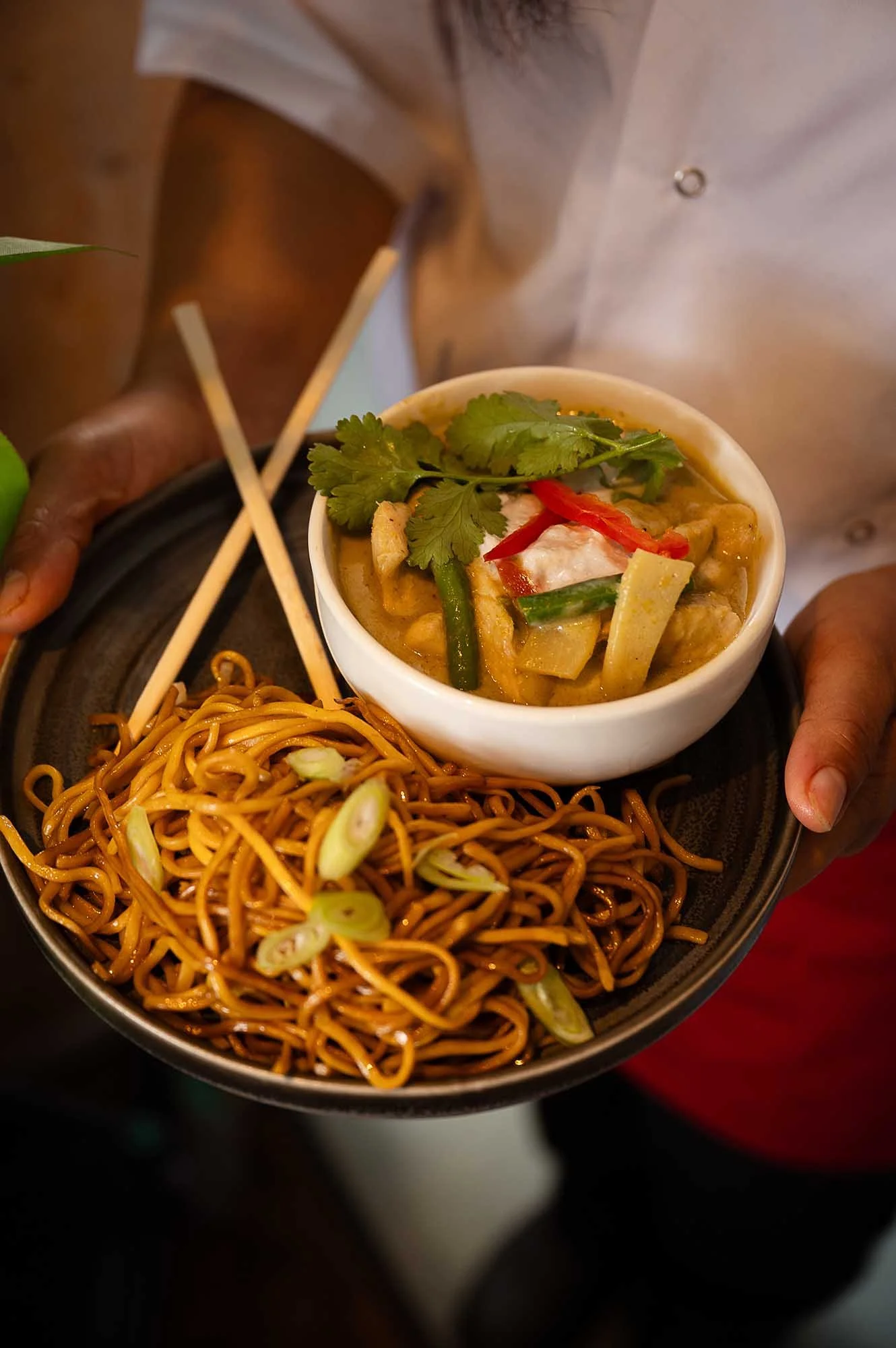 Thai green curry and noodles being served at the Tiny Thai, Cornwall