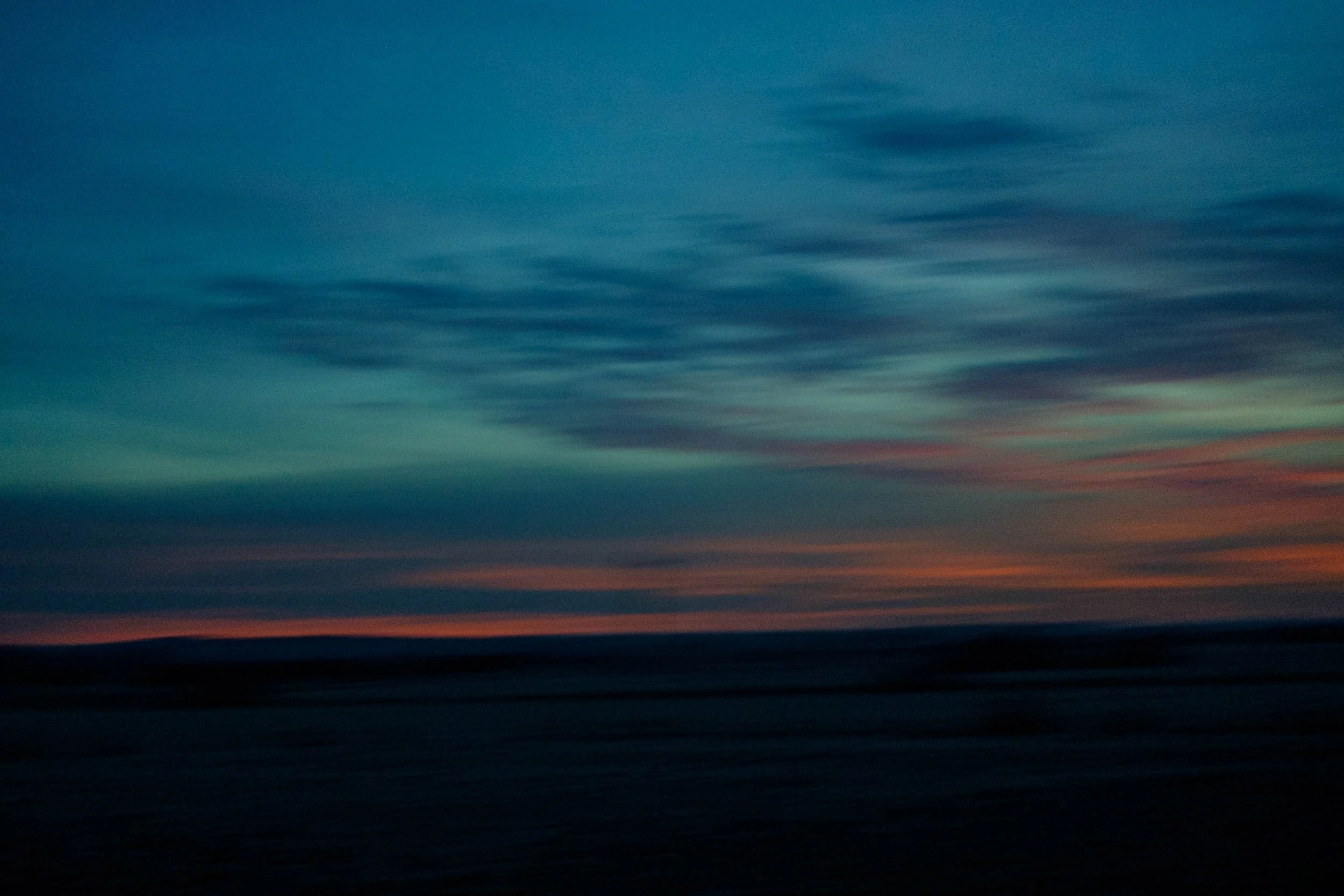 Abstract colours from dawn over Poland with motion blur create a painterly scene