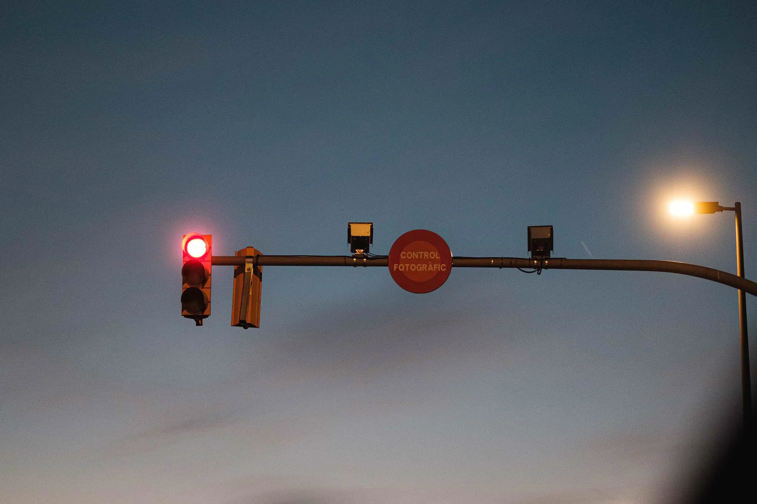 Abstract motion blur clouds with a street lamps and traffic signs and glowing lights