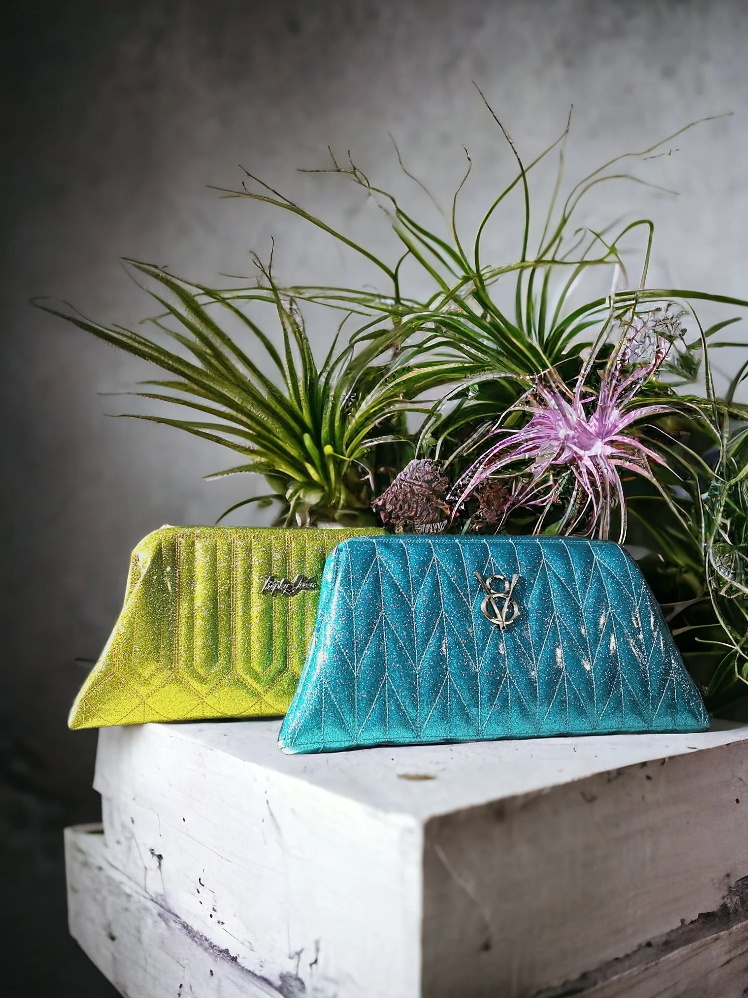 Image of two Trophy Queen Glitter Handbags