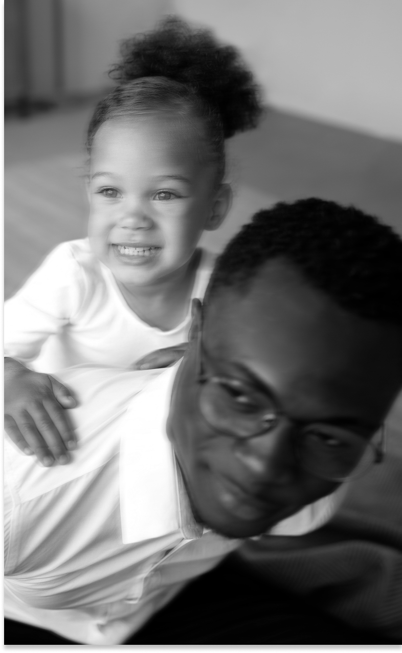 Father playing with toddler.