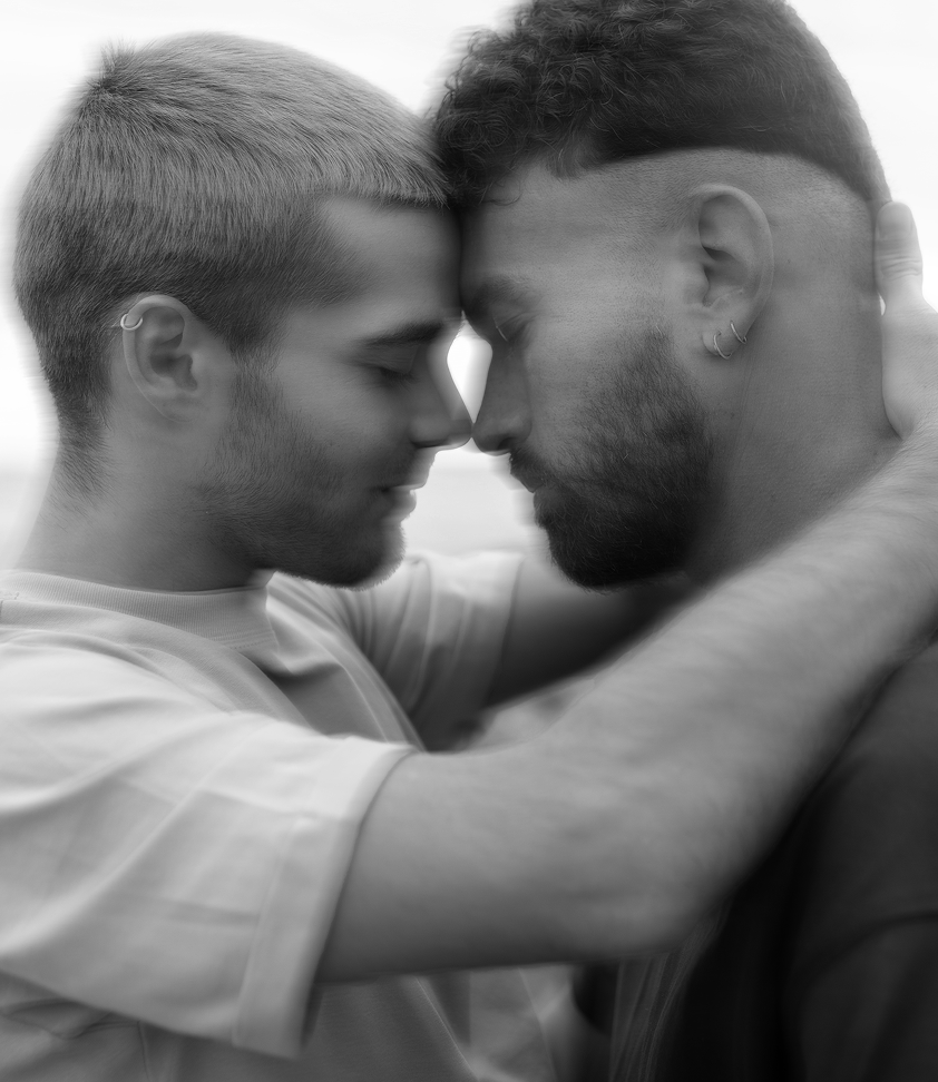 Two men in an embrace.