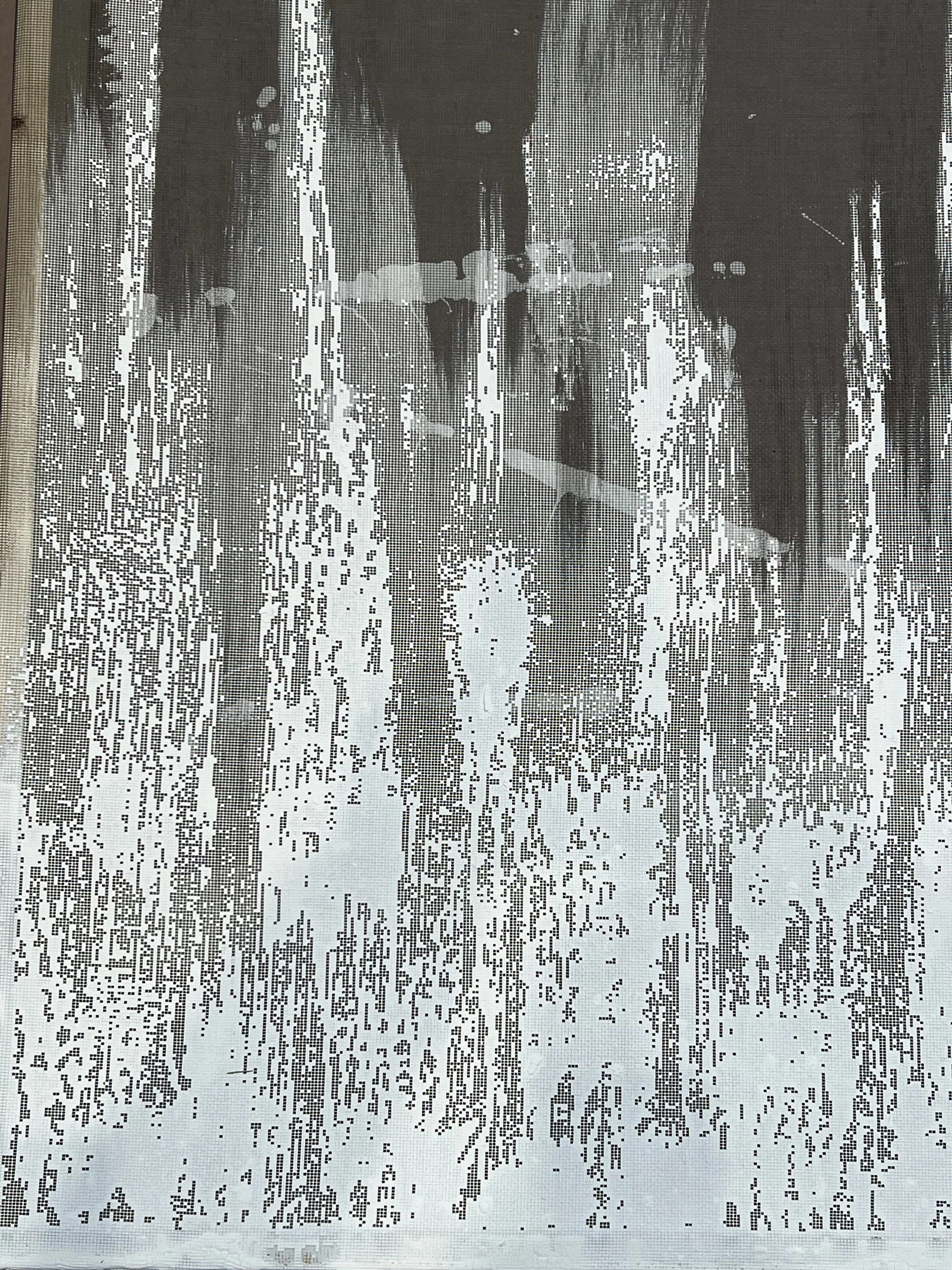 Image showing a textured, patterned surface with vertical lines and abstract shapes in black and white.