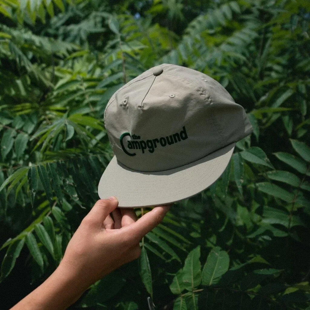 Hat Photo with Green Campground Logo