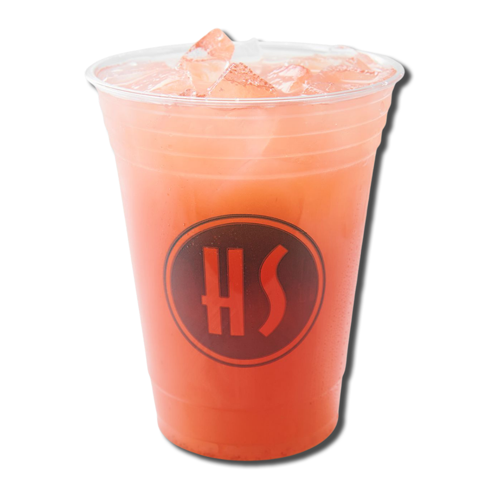 A clear plastic cup filled with pink beverage and ice cubes, with a black and red logo on the front.