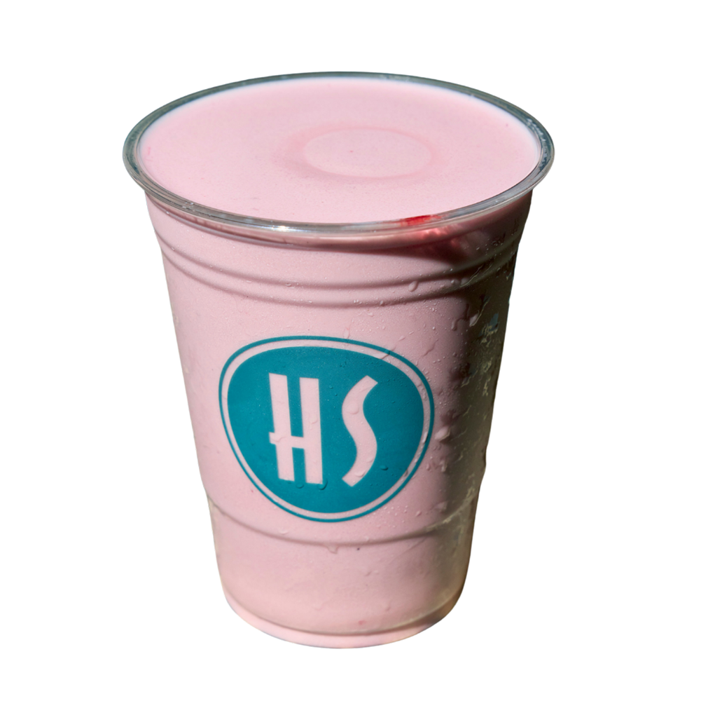 A pink milkshake in a clear plastic cup with a blue and white logo, against a black background.