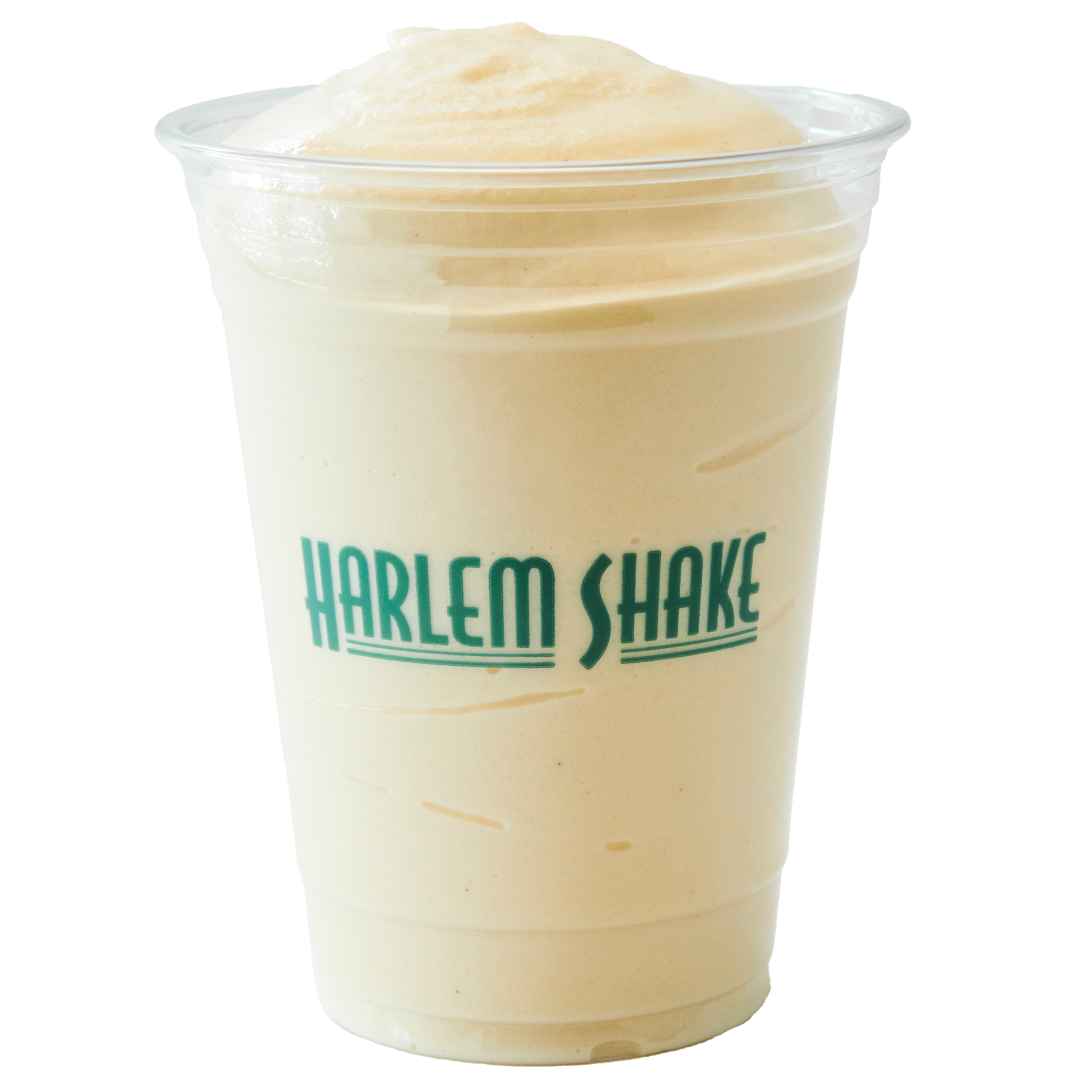 A clear plastic cup filled with a pale yellow blended frozen drink topped with whipped cream and a sprinkle of cinnamon or nutmeg.