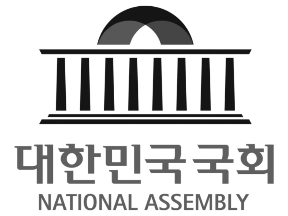 Logo of the National Assembly of South Korea featuring a building with columns and a semi-circular dome, with the text '대한민국국회' and 'NATIONAL ASSEMBLY' underneath.