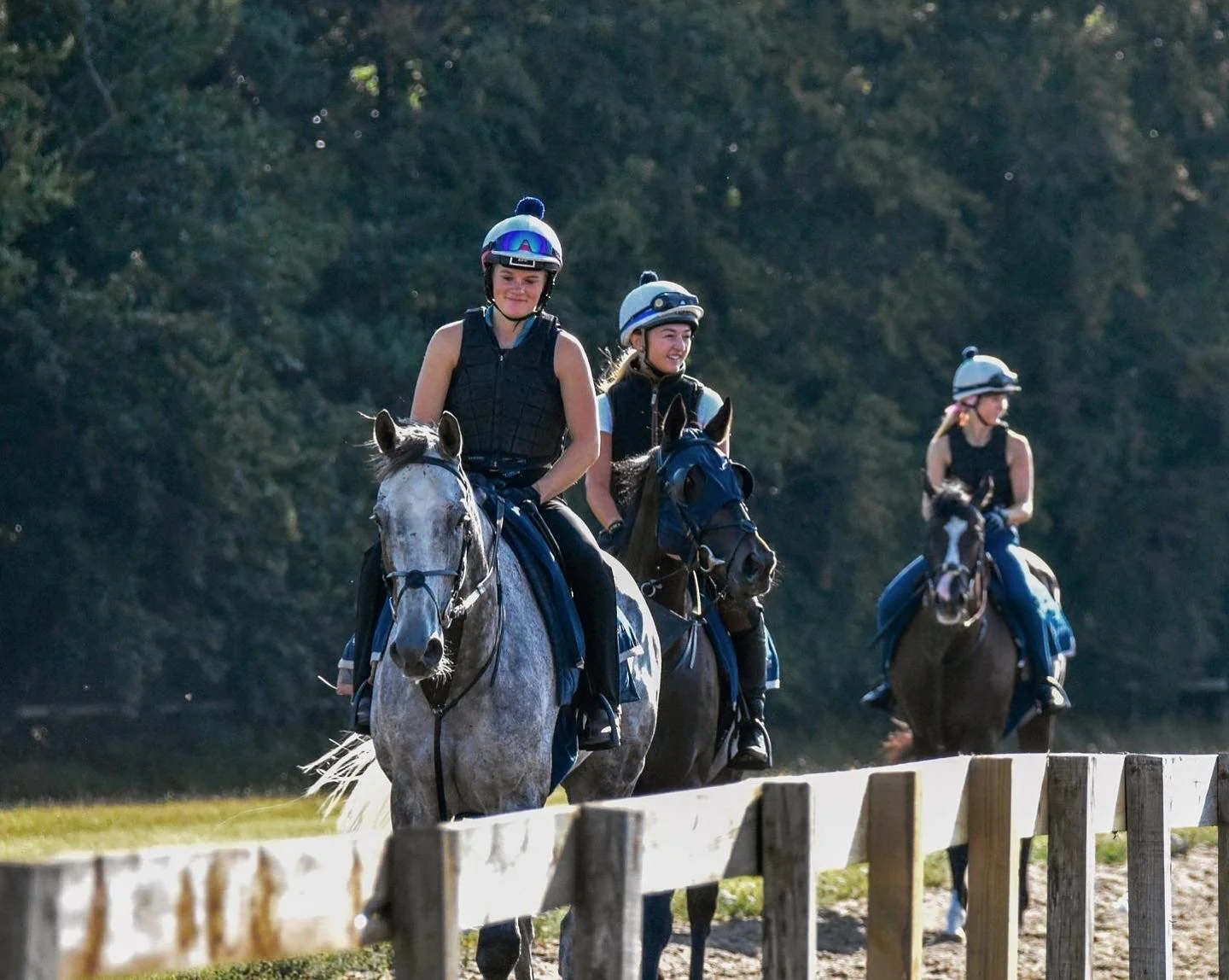 jack-jones-racing-exercise-riders-returning-along-training-rail-068.jpg