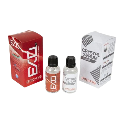 Two bottles of Gtechniq Crystal Serum Light and their packaging boxes, one red and one white.