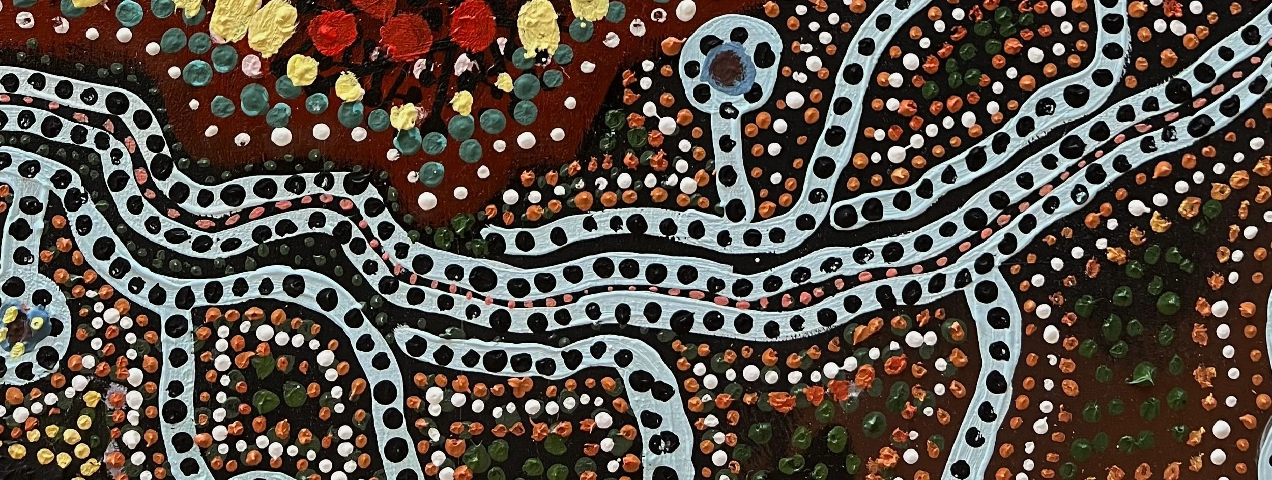 A colorful abstract painting featuring wavy white lines surrounded by small dots of various colors on a dark background.