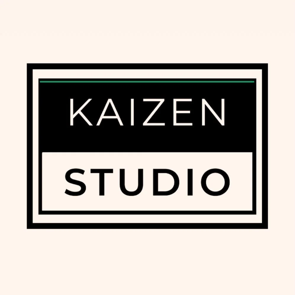 Black and white logo with the words "KAIZEN STUDIO" inside a rectangular border.