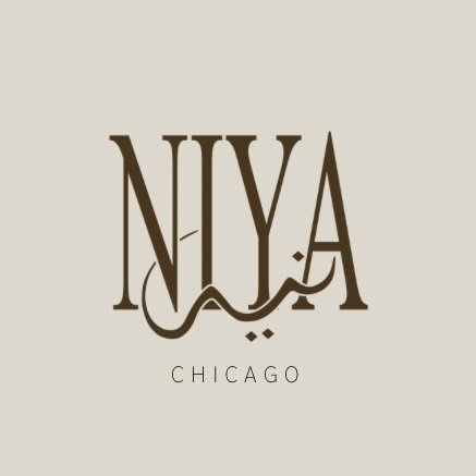 Logo with the text 'NIYA' and 'CHICAGO' underneath