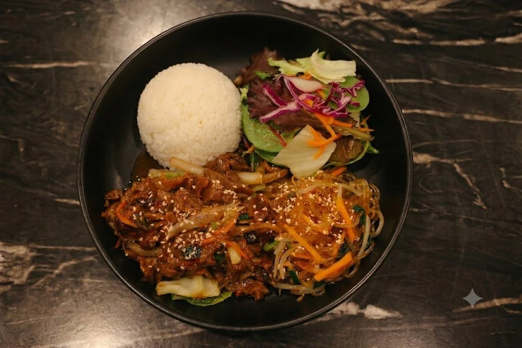 Bulgogi stir-fried marinated beef with teriyaki sauce, rice, and glass noodles
