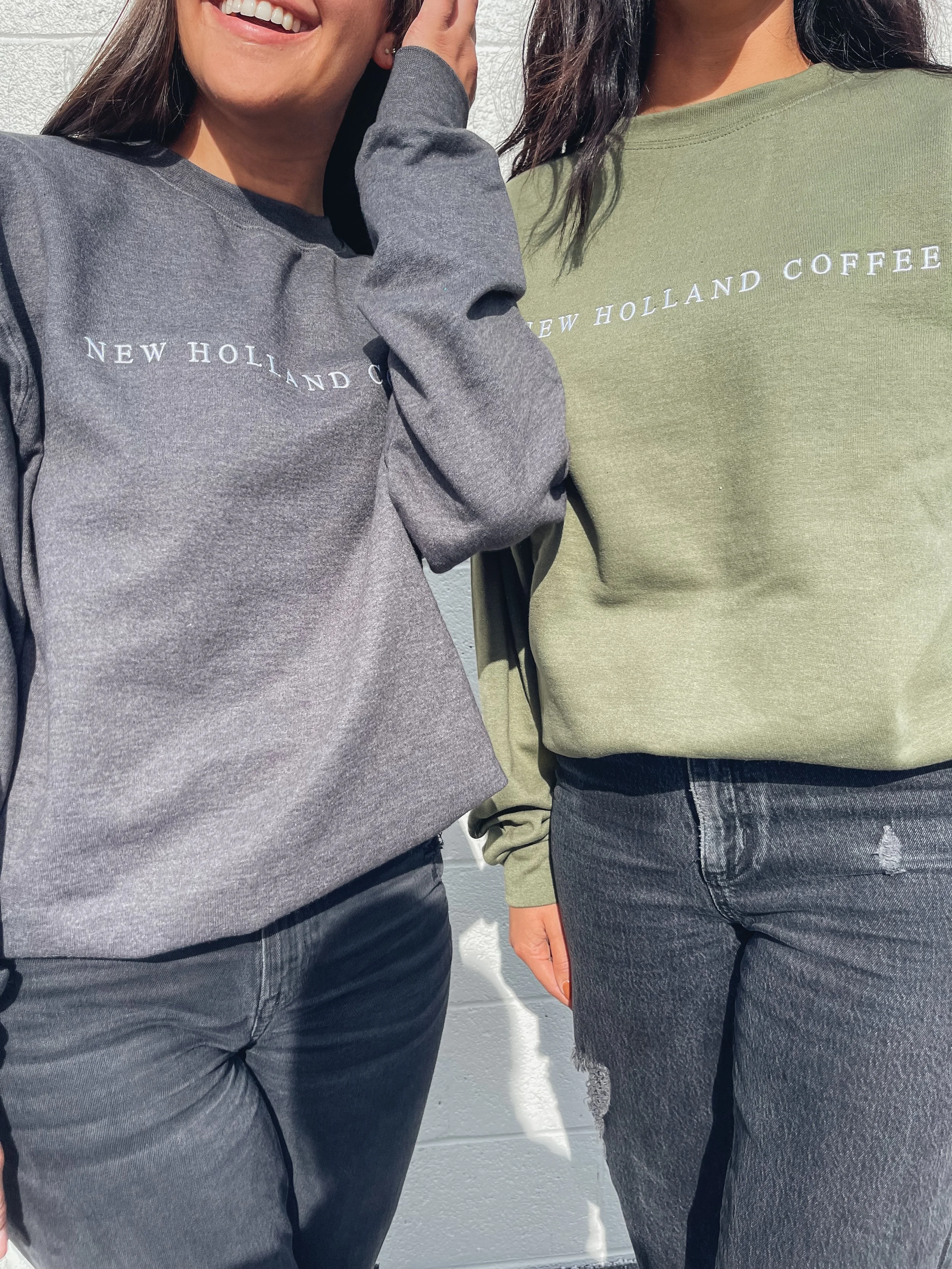 Casual New Holland Coffee gray and green sweatshirts.