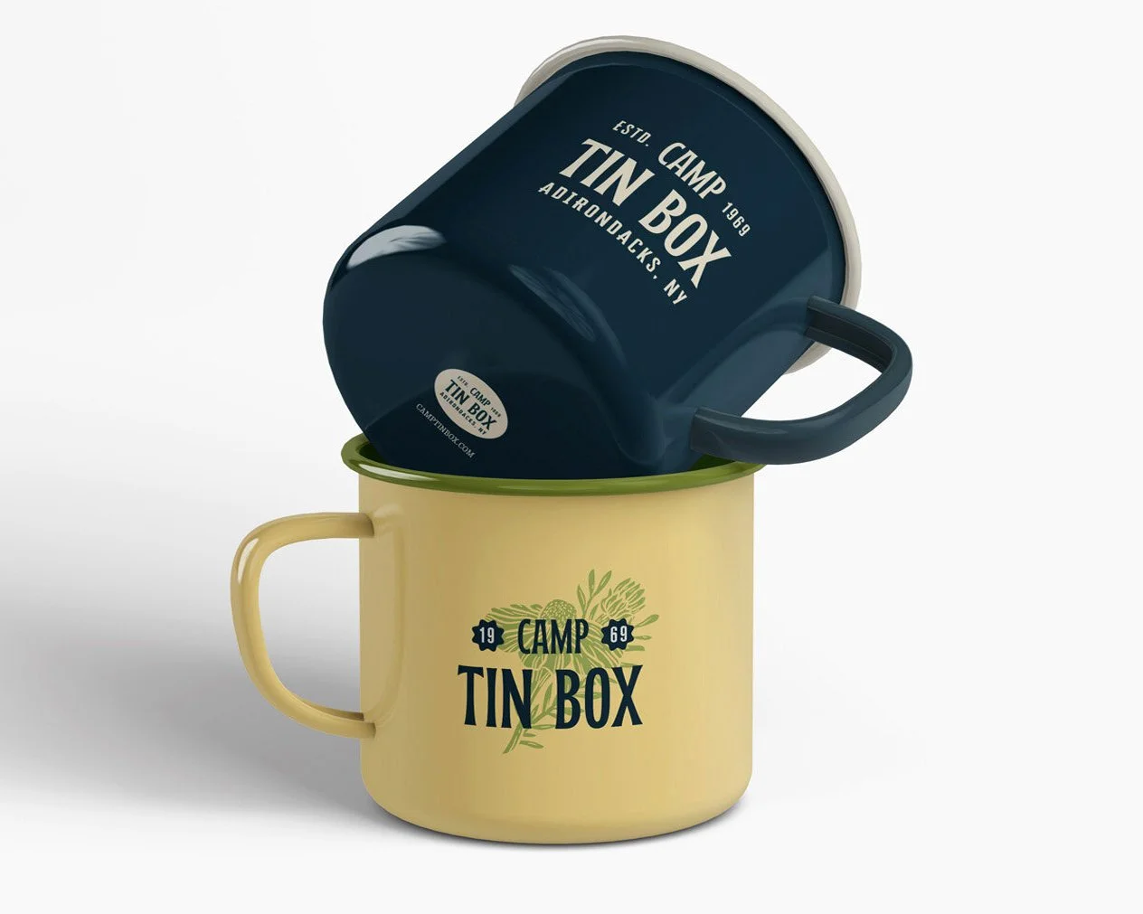 Custom branded enamel camp mugs fora campsite in the Adirondacks NY, featuring vintage-inspired typography and original botanical illustration in navy and olive on cream and navy colorways.