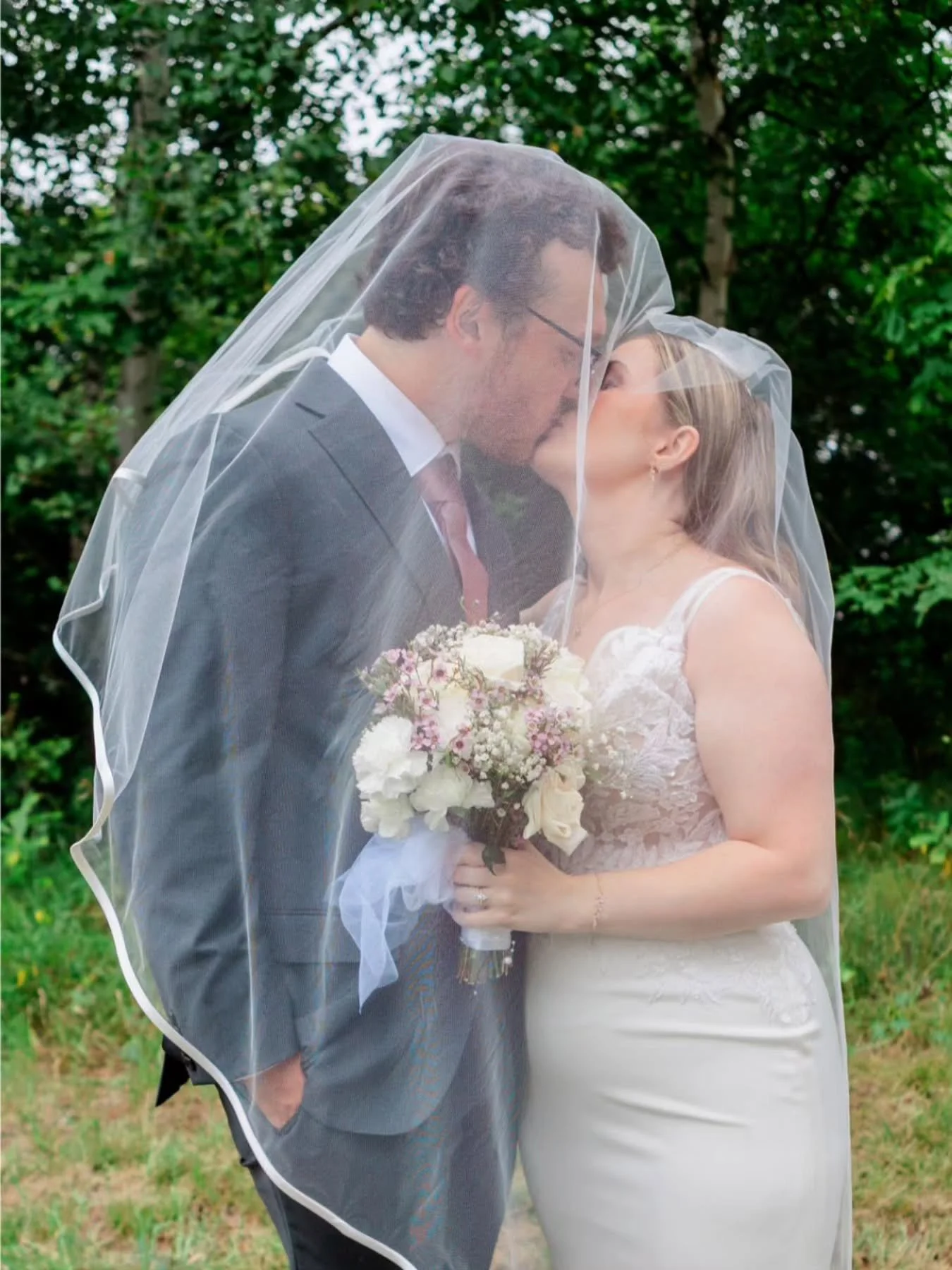 I'm going through the archives to post some things I haven't shared yet... Here's Lianna &amp; Gavin on their rainy but beautiful wedding day. 😊