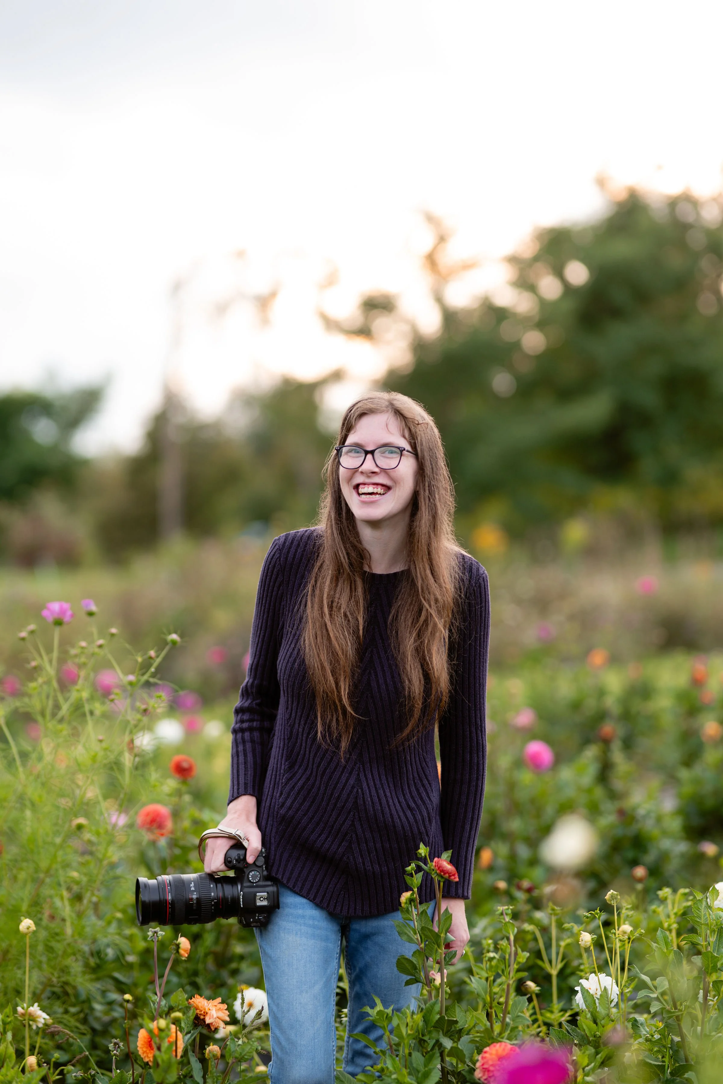 EmilyFlowerFieldTakenbyNaomi_EmilyMaeAnnPhotography2026.jpg