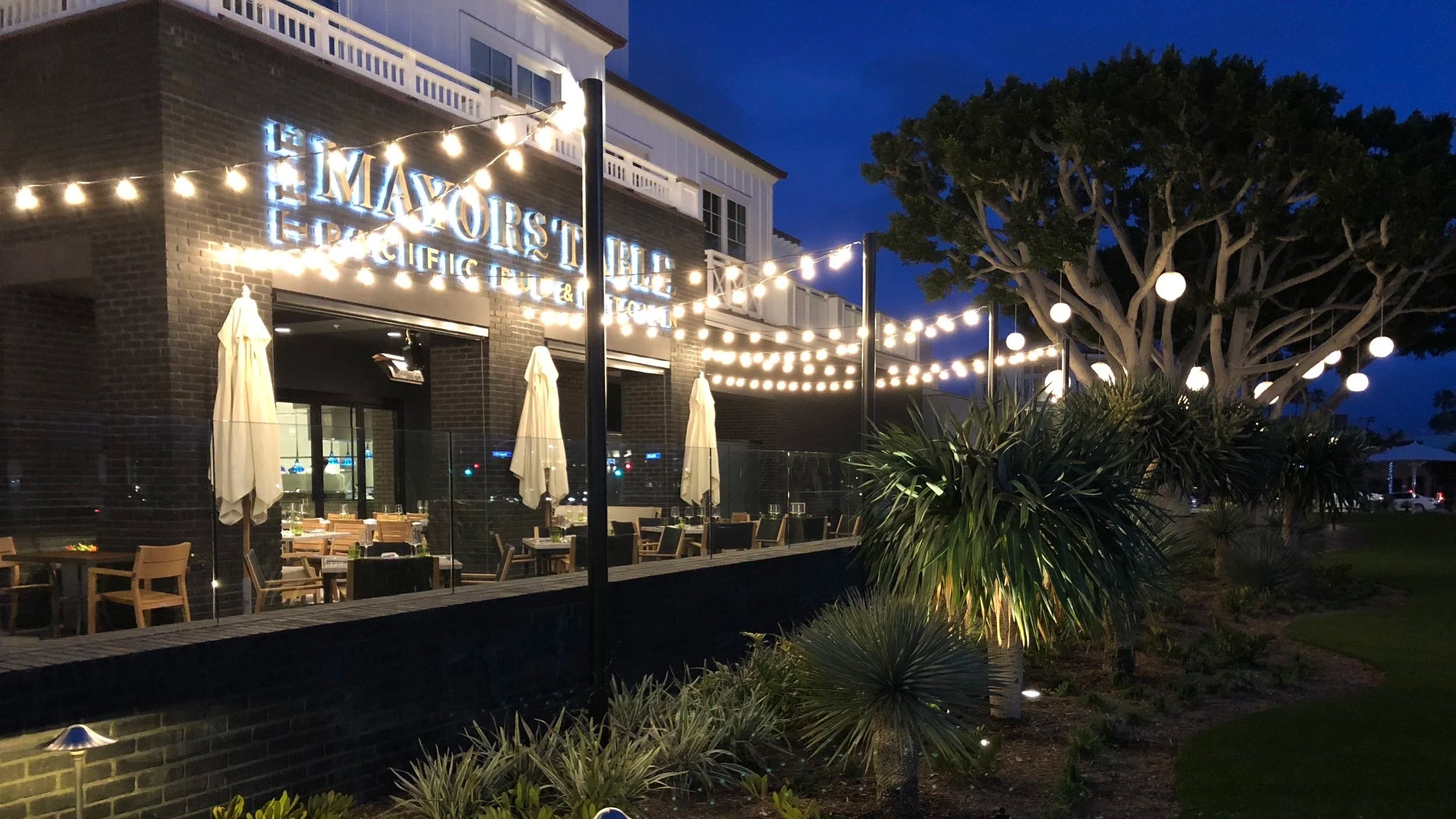 Mayors Table restaurant patio at night