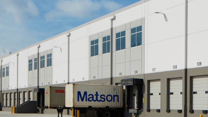 exterior of commercial building with garage doors