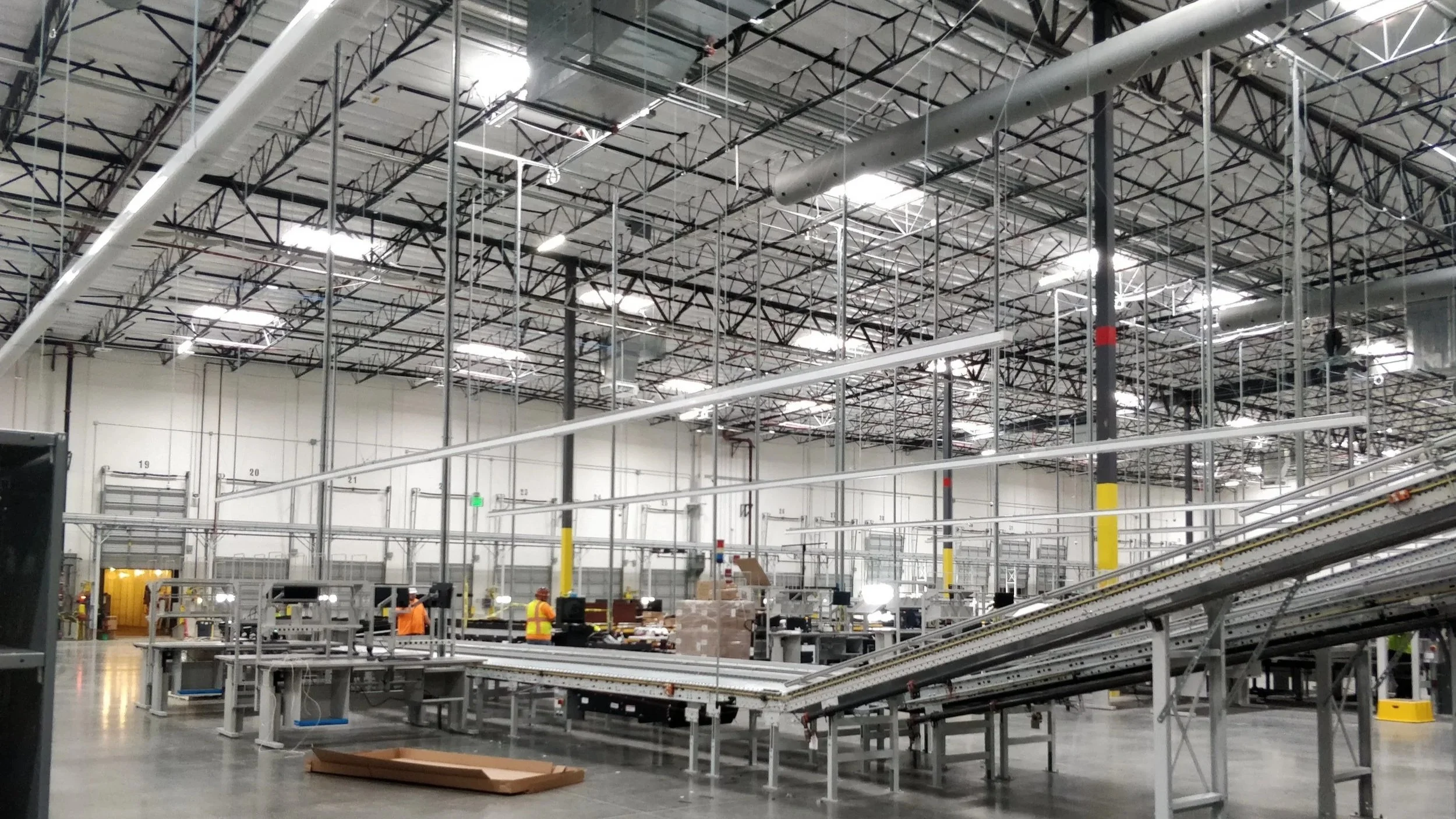Warehouse with conveyor belt