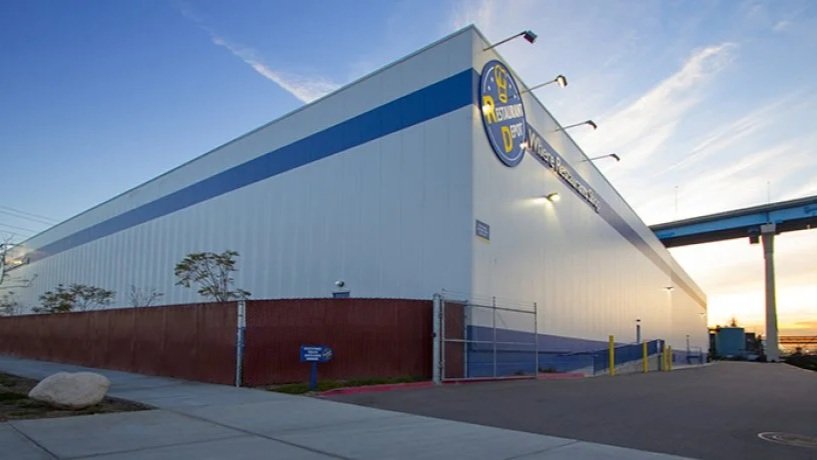 Exterior of Restaurant Depot with Coronado Bridge in background