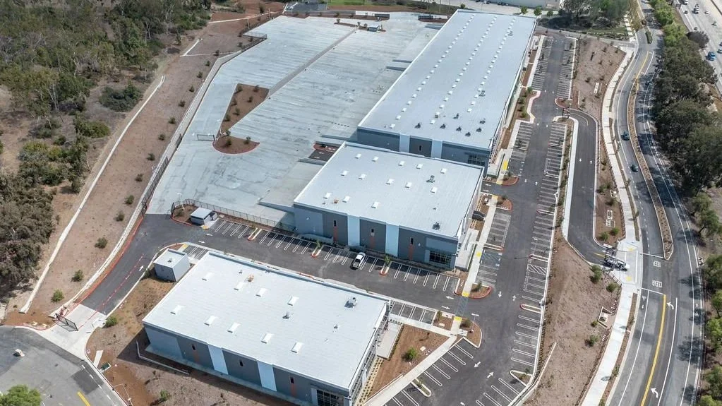 aerial shot of a commercial and industrial development by the freewa