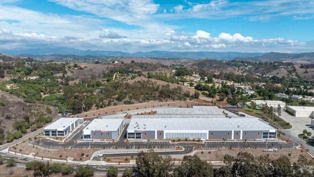 aerial shot of a commercial and industrial development by the freewa