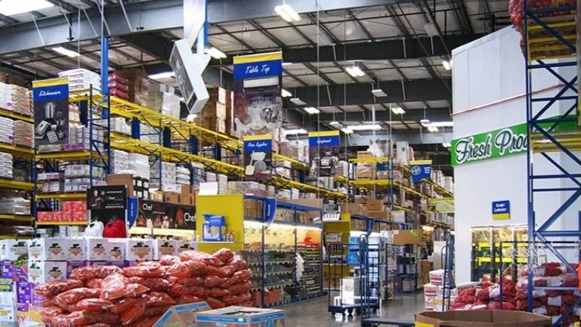 stocked warehouse shelves with restaurant supplies