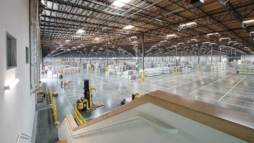 looking down on warehouse from interior second floor