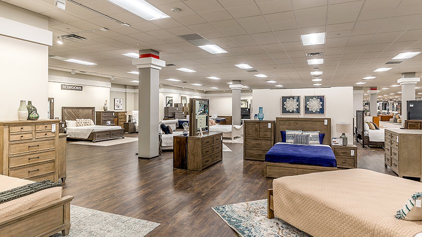 Living Spaces showroom with bedrooms set up