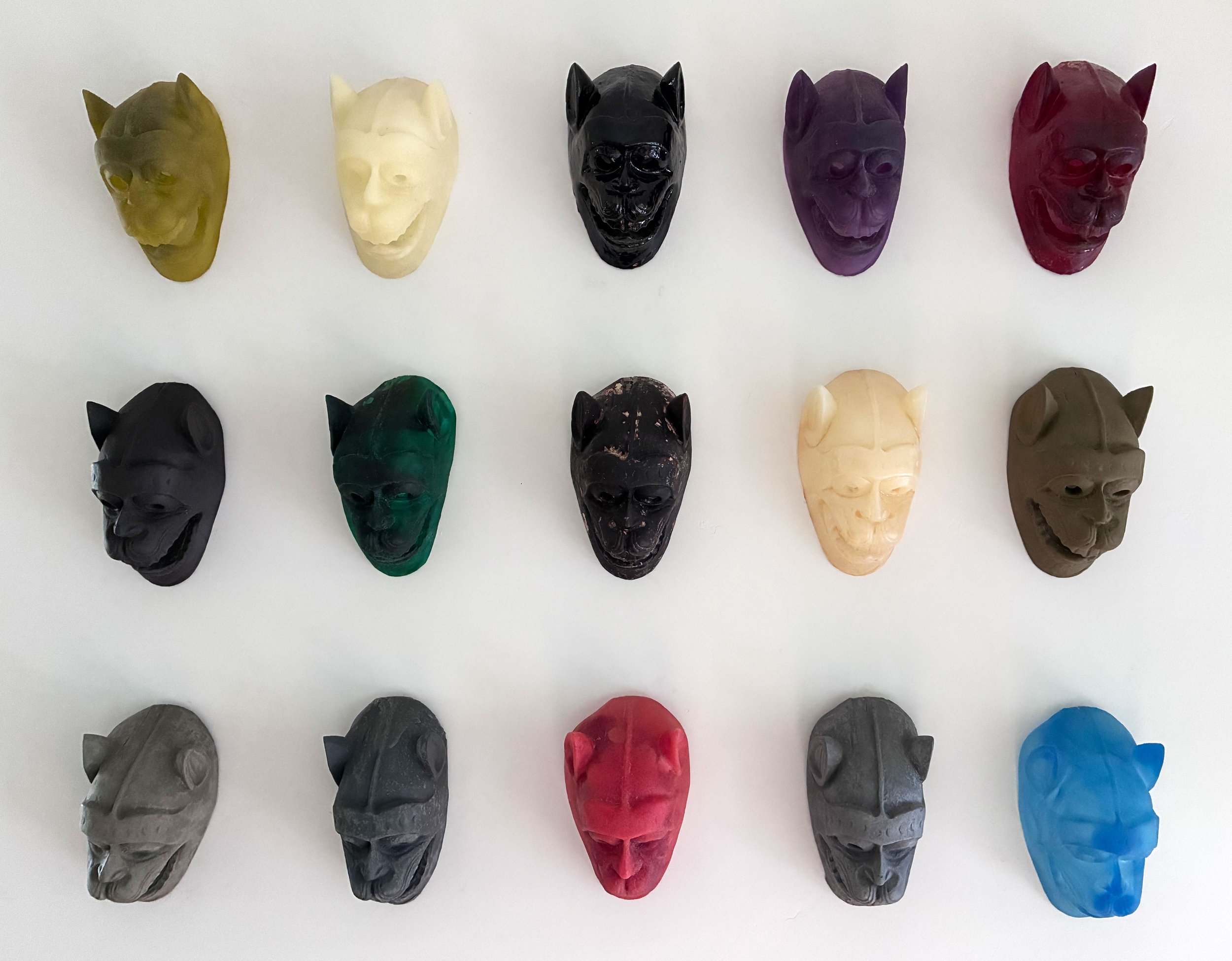 FIFTEEN DEMON MASKS. 2021—9’ x 6’, Cast Colored Resin