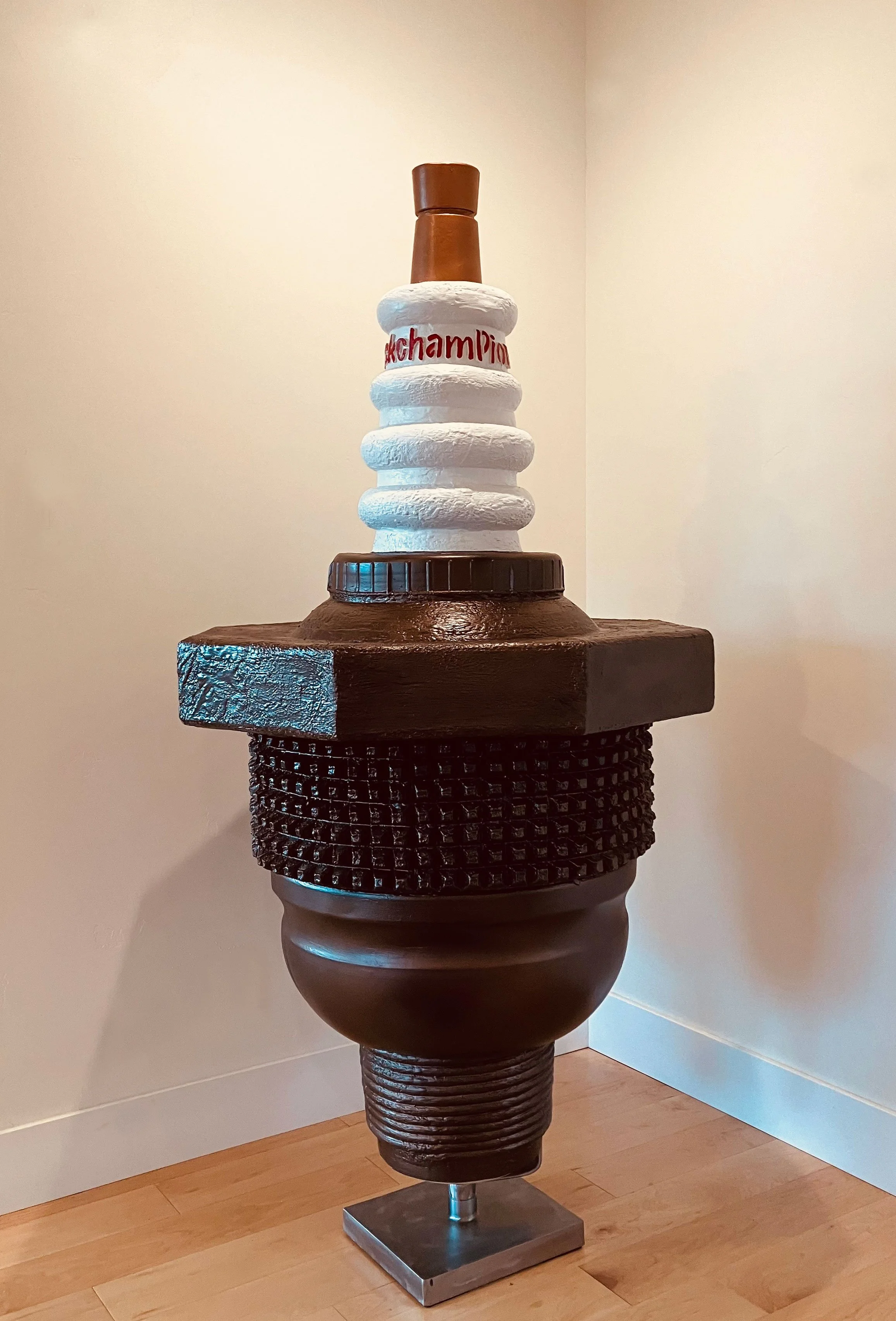 CHAMPION SPARKPLUG,  59” X 30”, Cast Plaster on Rotating Stand