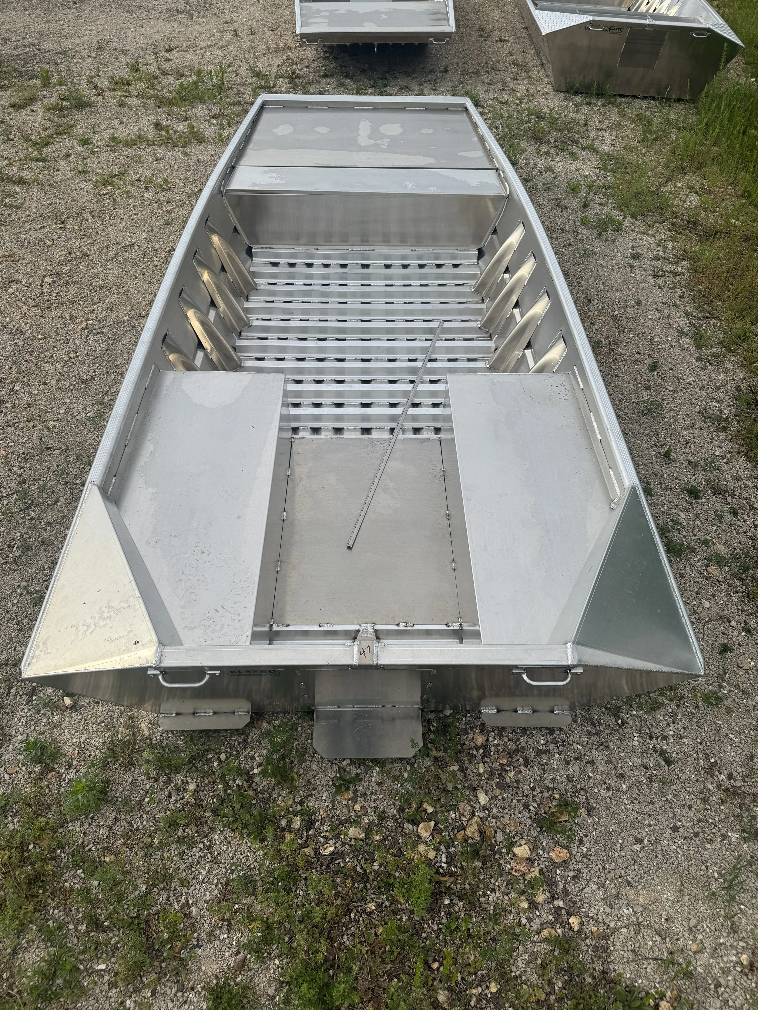 17-56 Sport, 27" Transom, 48" Deck, 15" Extension, 55" Tiller Pods, Long Corners, Extra Floor Ribs, Trim Tabs, Splash Plate 