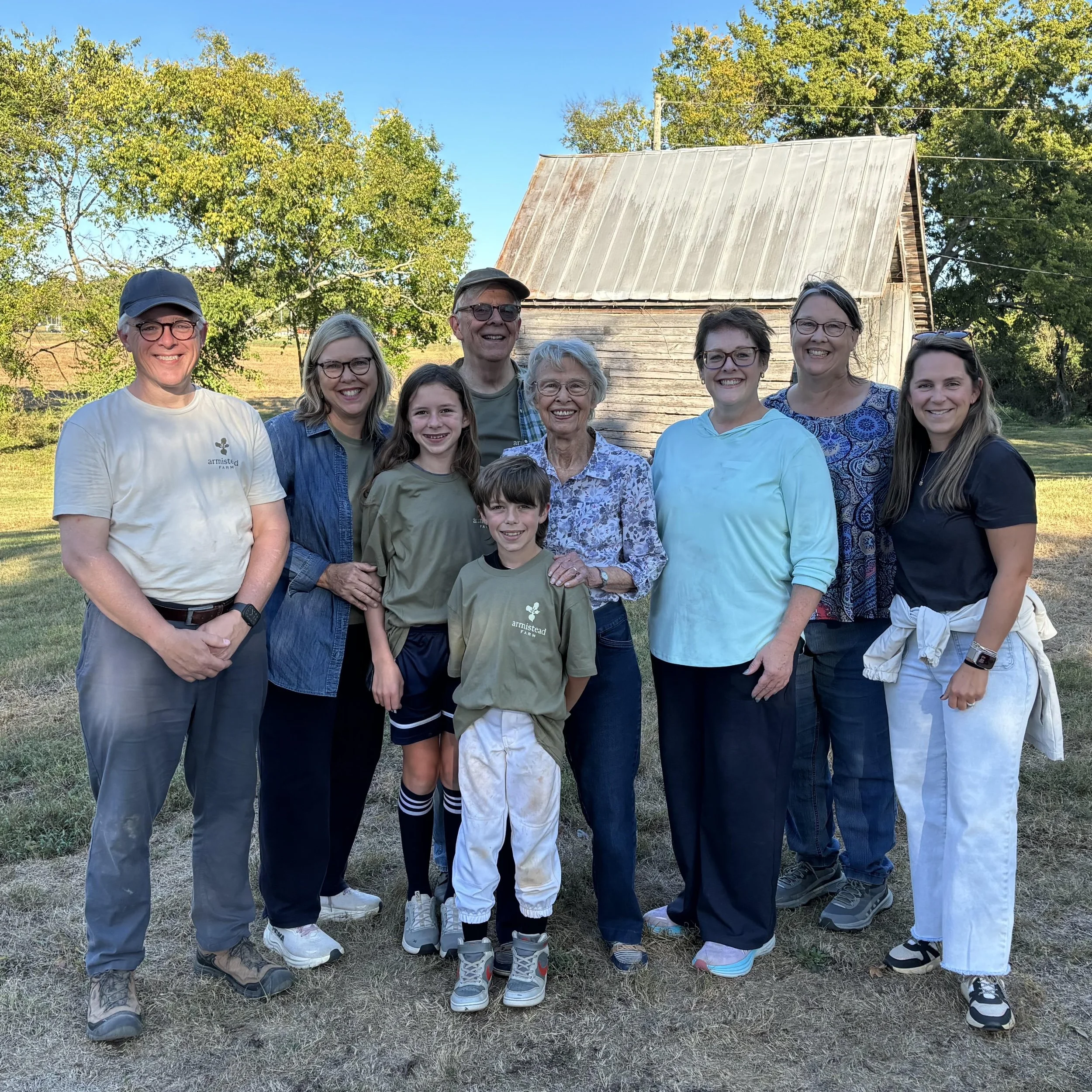 4 generations of the short family posing together for a group photo on the farm