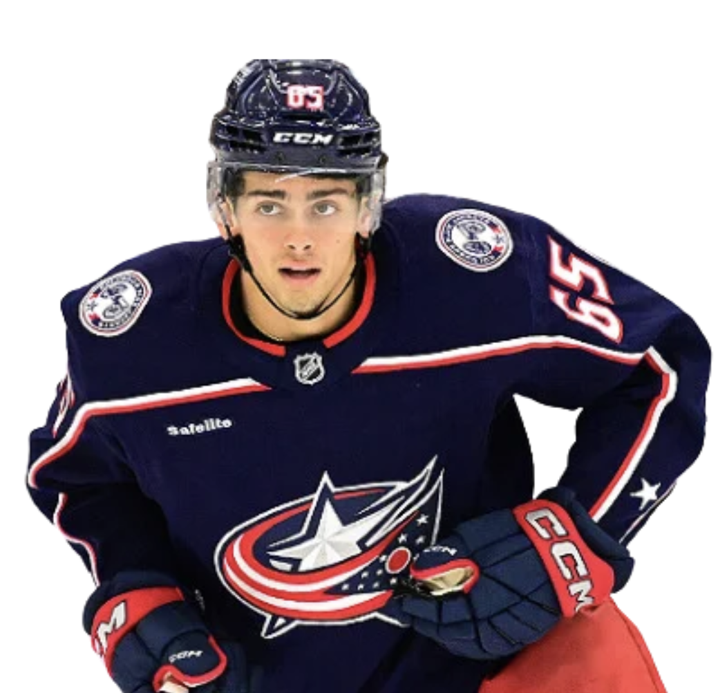 A young male ice hockey player wearing a navy blue Columbus Blue Jackets jersey with red and white accents, a black helmet, red gloves, and holding a hockey stick.