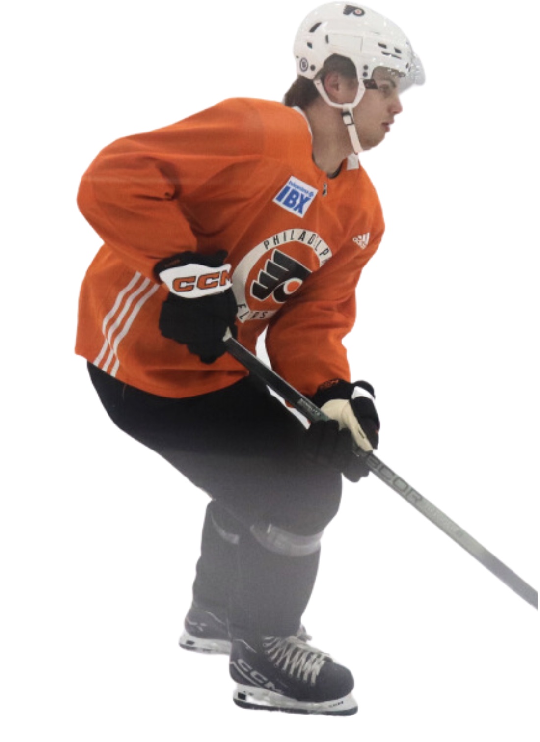 Ice hockey player in orange jersey with Philadelphia Flyers logo, wearing a white helmet, black gloves, black pants, and skates, holding a hockey stick.