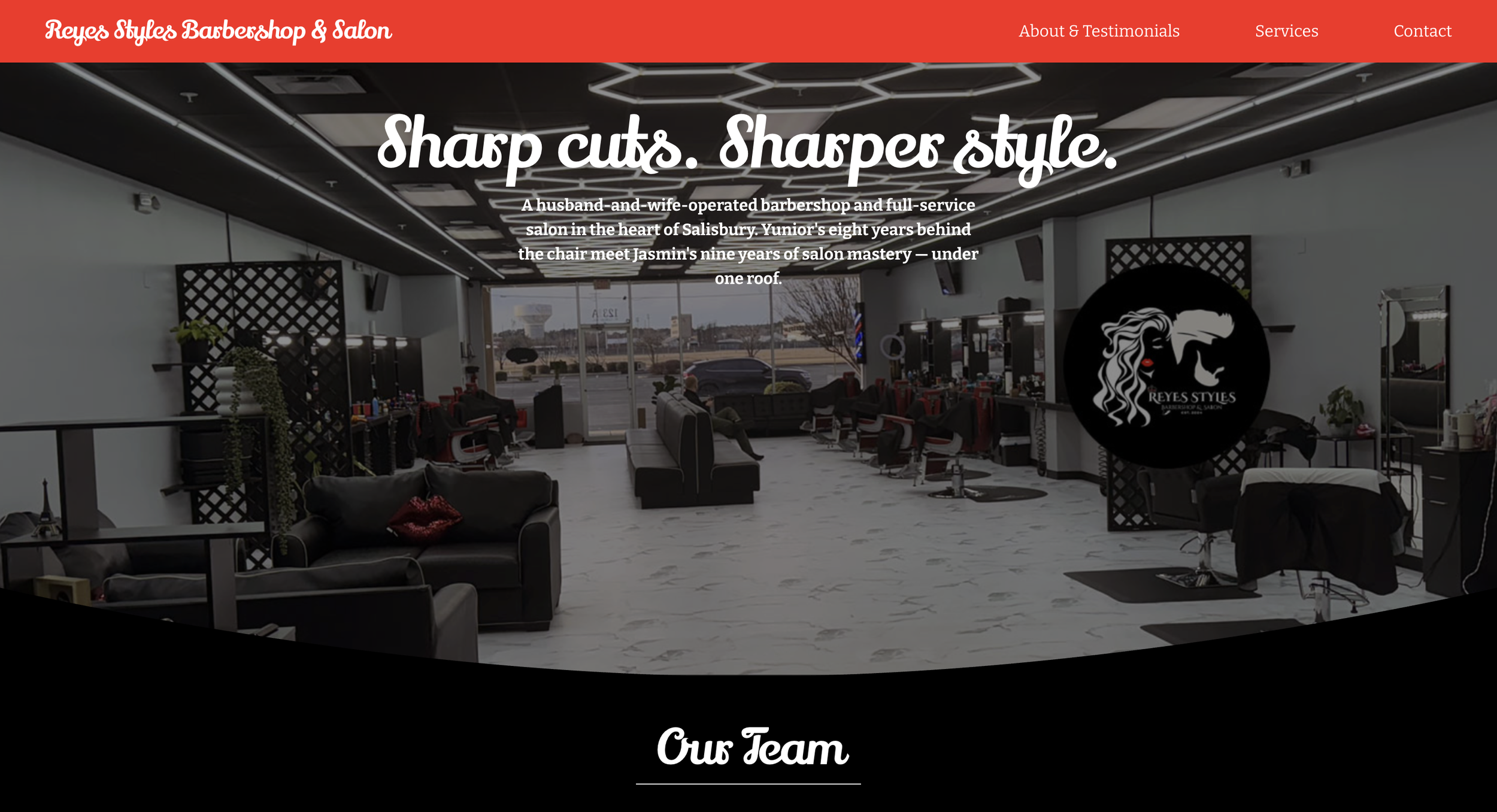 Interior of Reyes Styles Barbershop and Salon with chairs, mirrors, and hairstyle stations, and a large window letting in natural light.