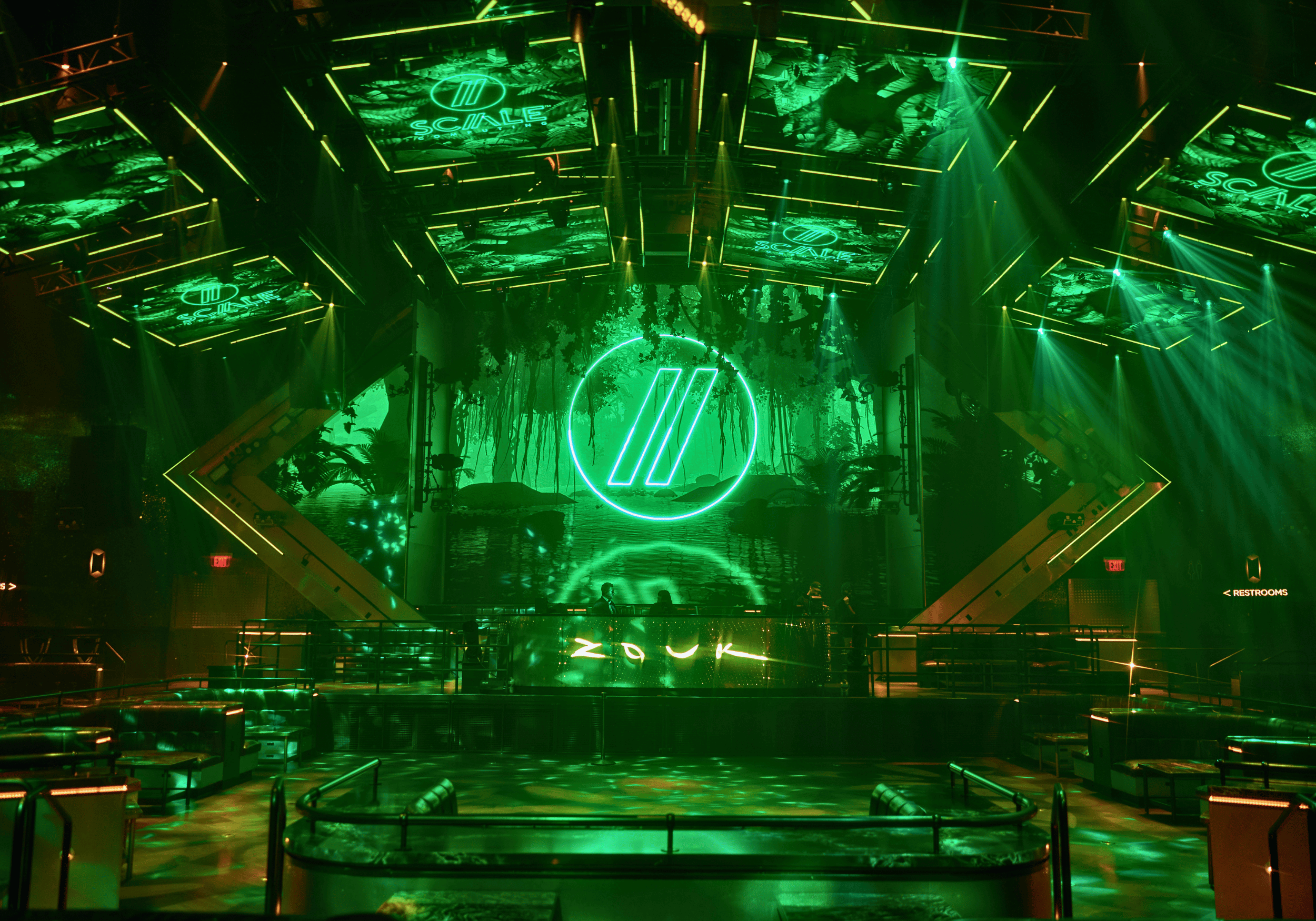 Picture of a room at Scale Computing Platform 2026 with green overhead lighting.