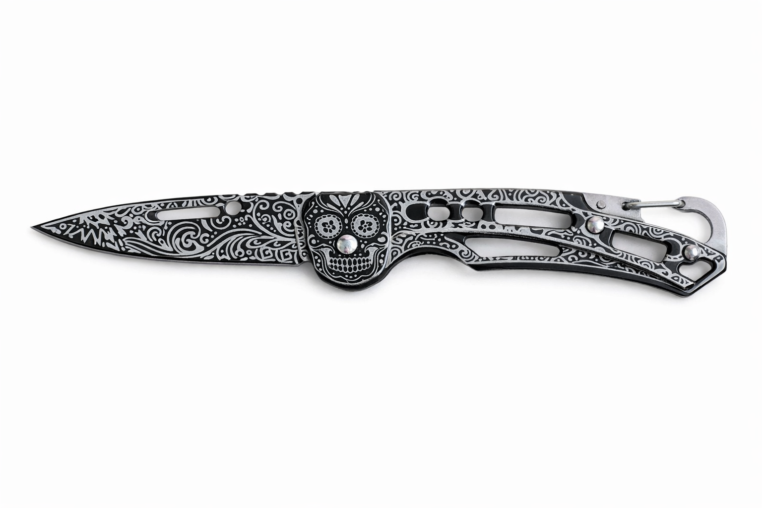 Decorative folding pocket knife with a black and silver skull design on the handle and blade, with intricate patterns and a locking mechanism.