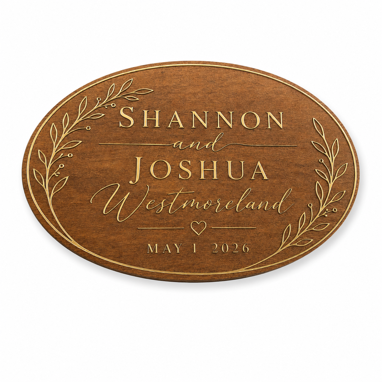 Wooden wedding plaque with gold embossed text for Shannon and Joshua's wedding on May 1, 2026, decorated with floral accents and a heart