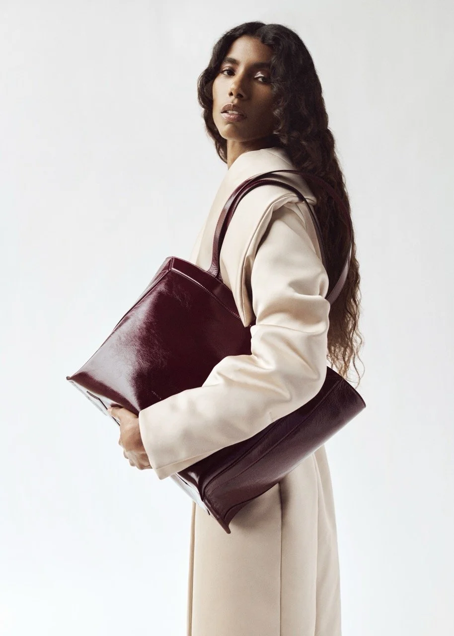 WANDLER_FALL26CAPSULE_EDITORIAL_IDA_TOTE_MEDIUM_OXBLOOD_GLAZE_01 Large.jpeg